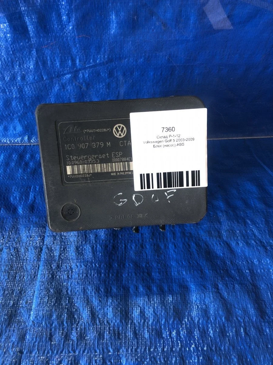 Блок (насос) ABS Volkswagen Golf Mk5 (2003—2009)