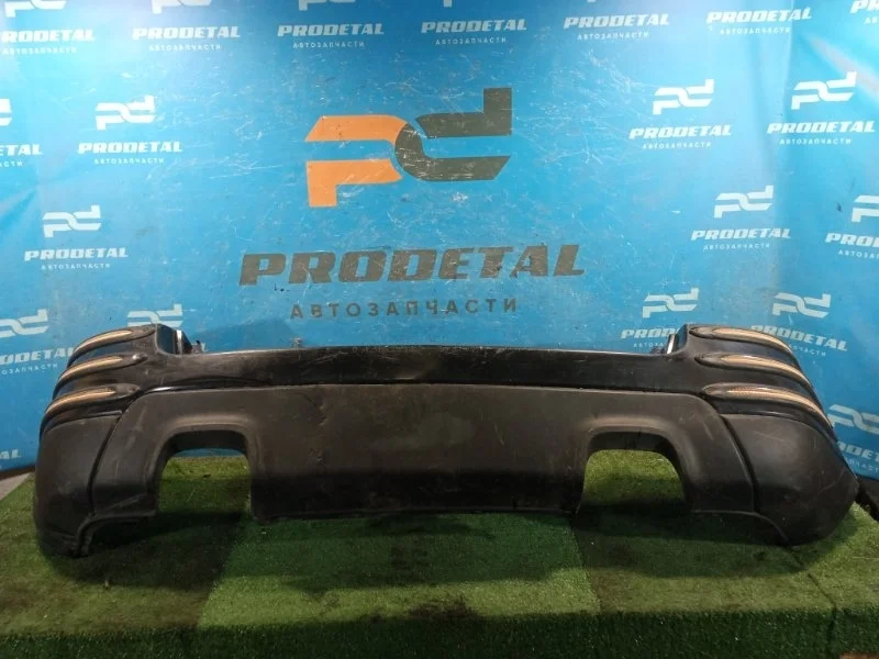 Бампер задний Kia Sportage 2004-2010