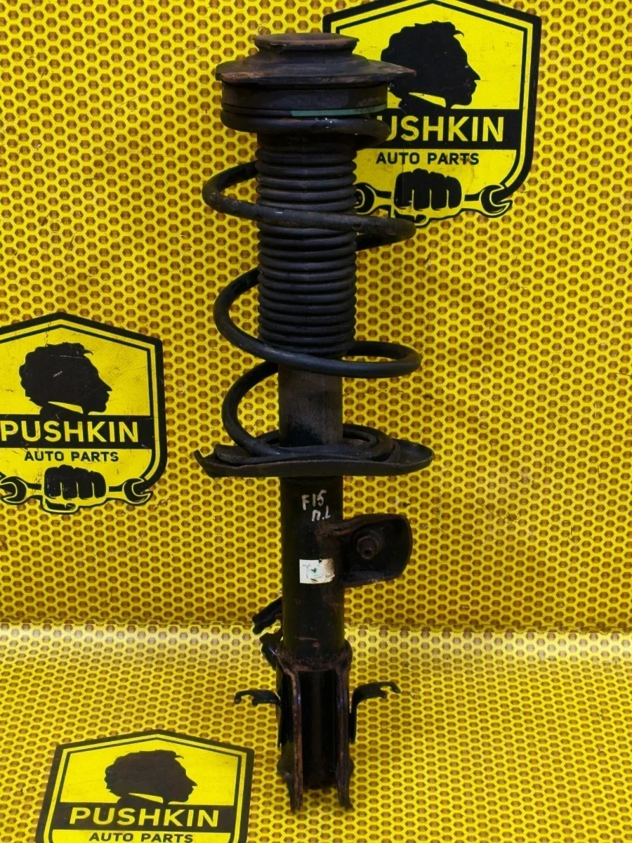 Амортизатор подвески Nissan Juke 2011 E43031KA1A F15 HR16DE, передний левый