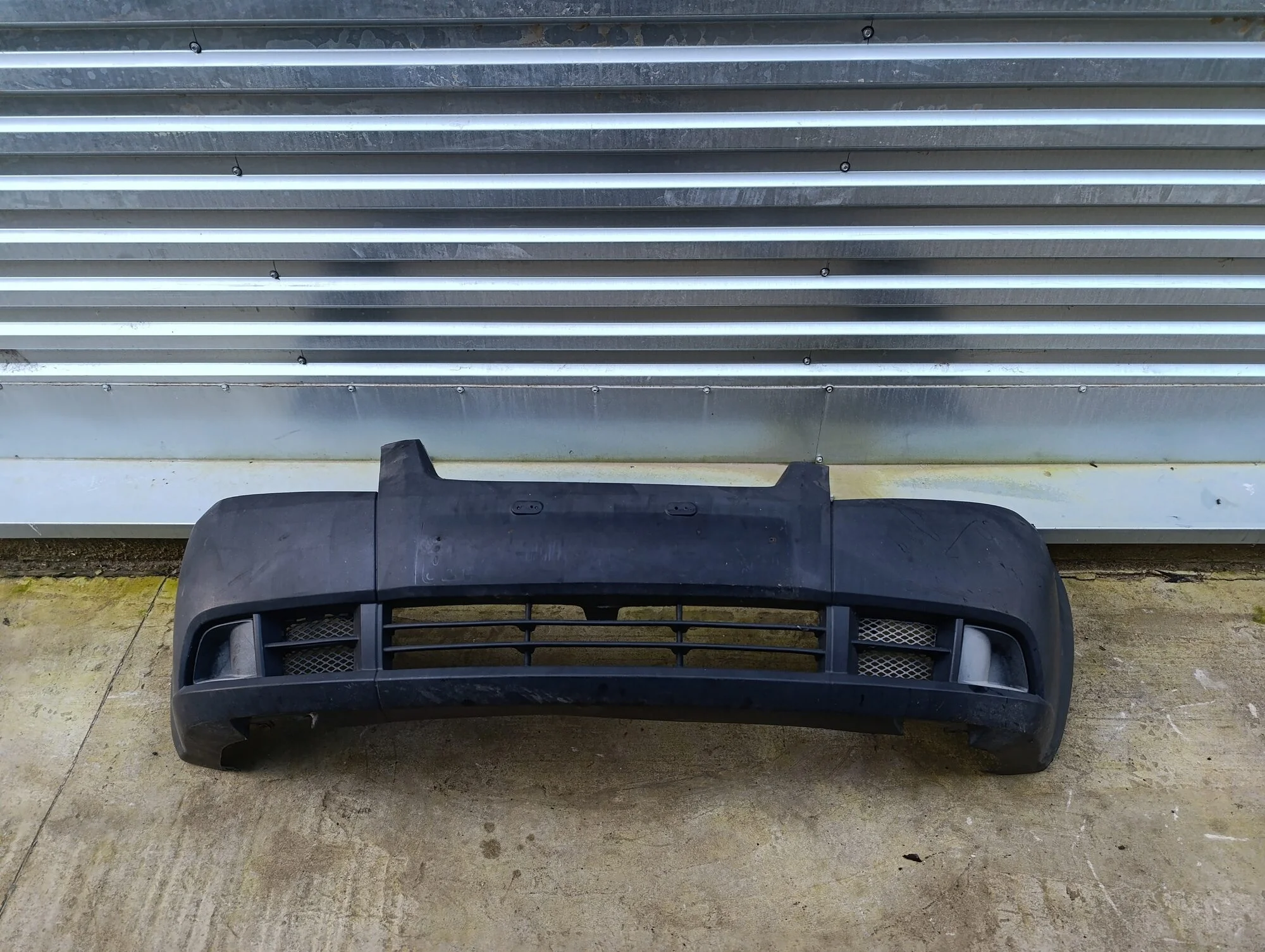 Бампер передний Aveo (T250) 2005-2011