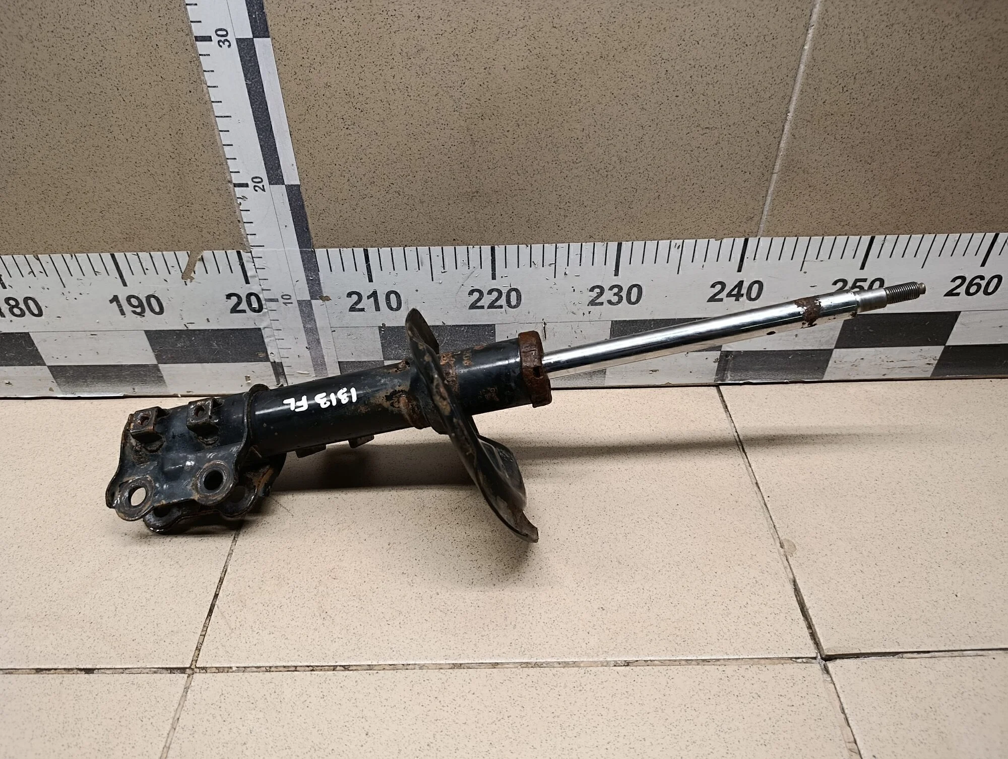 Амортизатор передний левый Cerato 2009-2013