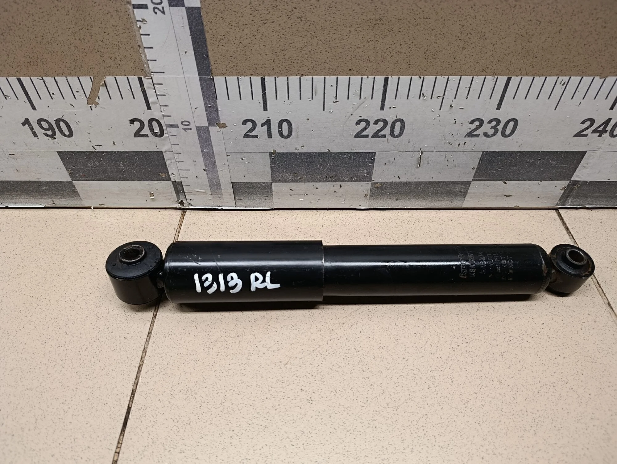 Амортизатор задний левый Cerato 2009-2013