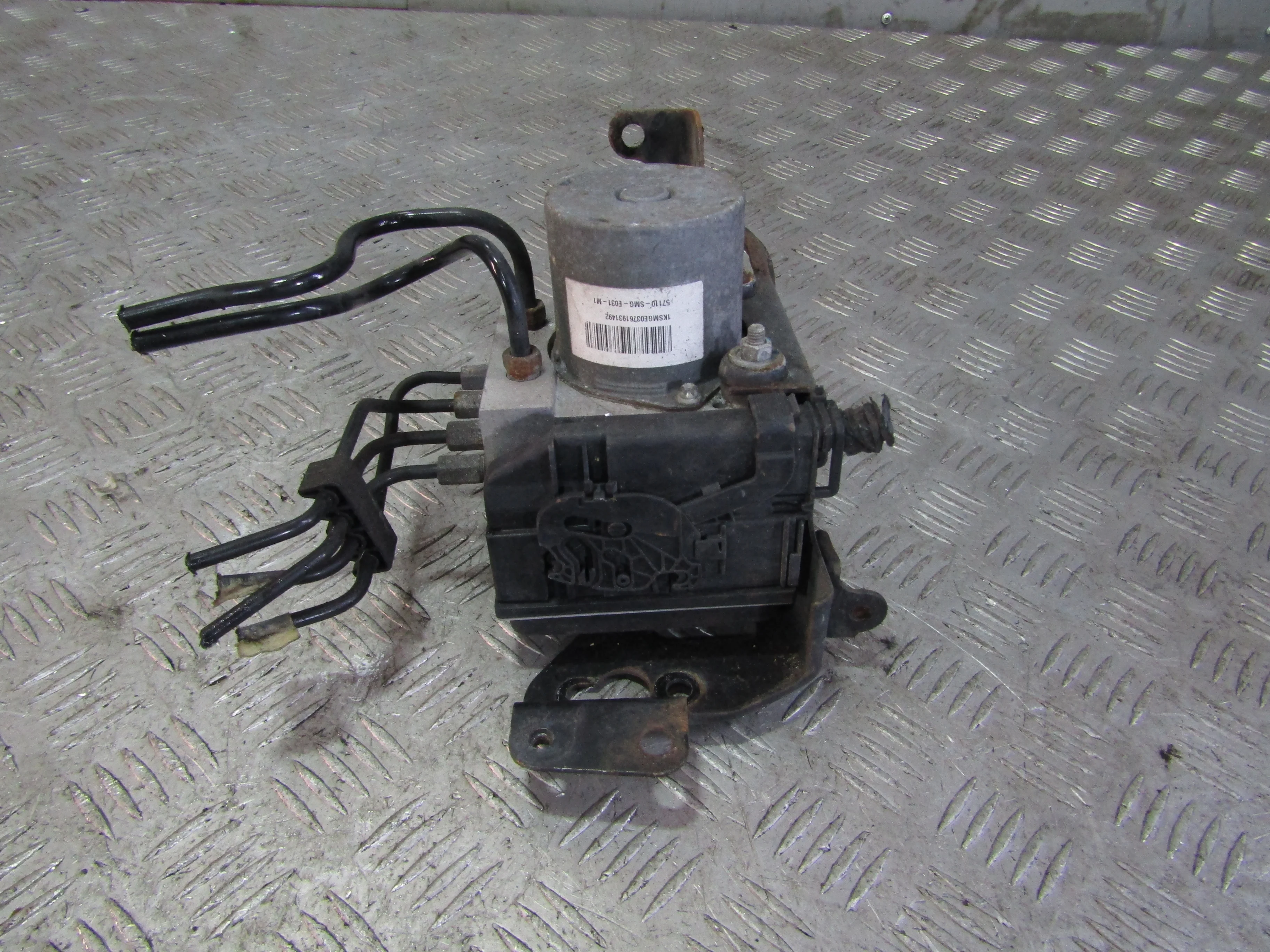 Блок ABS (насос) HONDA Civic VIII (2005—2009)