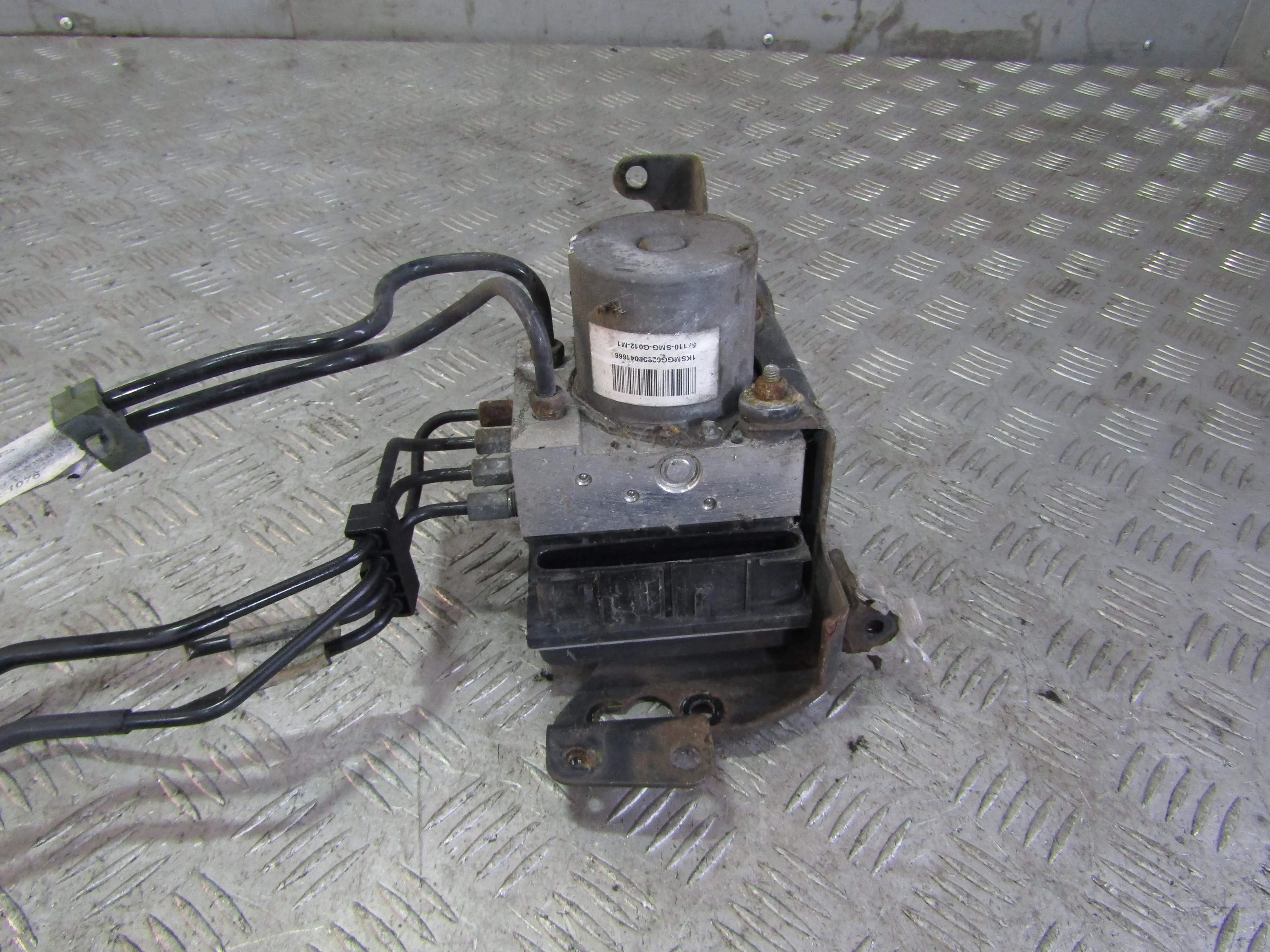 Блок ABS (насос) HONDA Civic VIII (2005—2009)