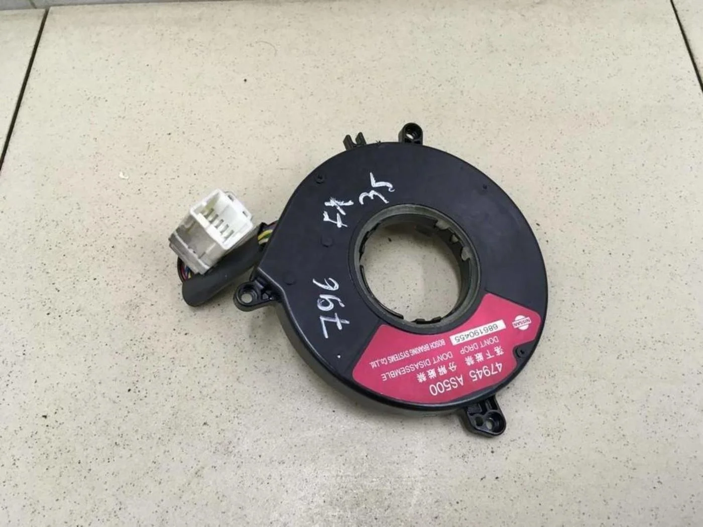 Датчик угла поворота рулевого колеса Almera N16 2000-2006