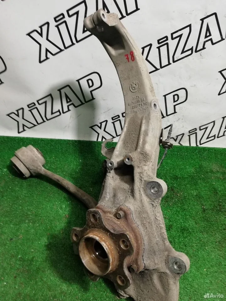 Кулак поворотный левый x5 x6 x7 g05 g06 g07