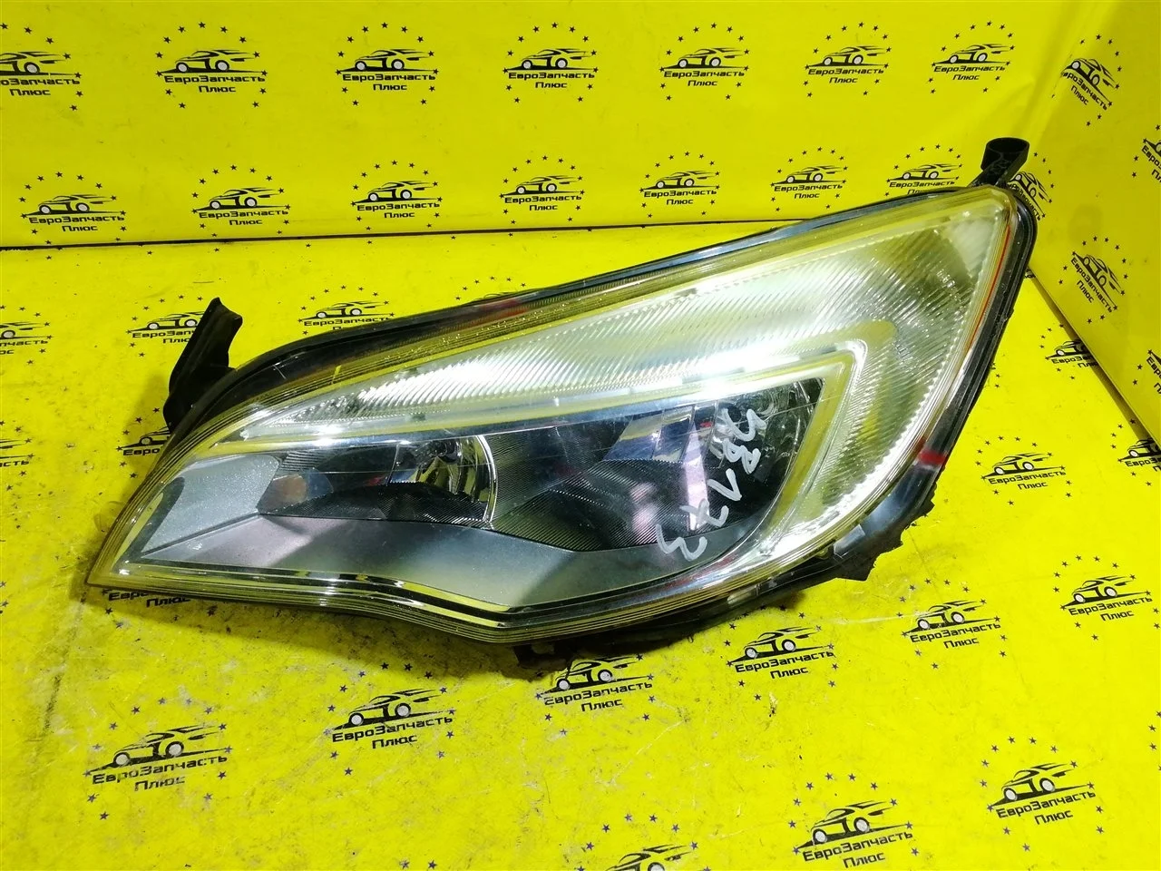 Фара Opel Astra 13253656 J, передняя левая