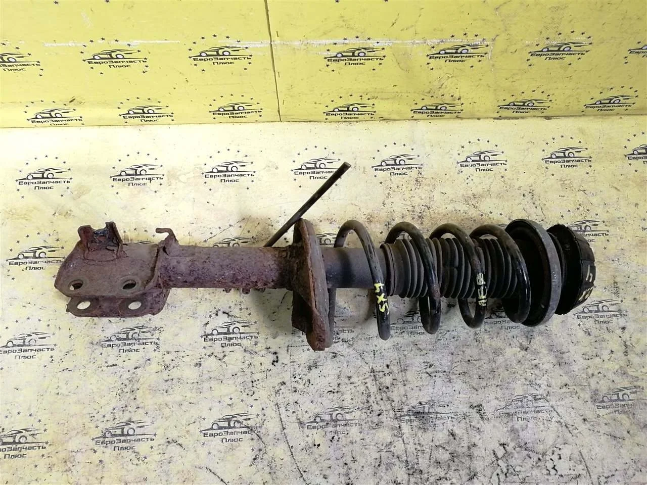 Стойка амортизатора Suzuki Sx4 4160279J02 GY, передняя левая