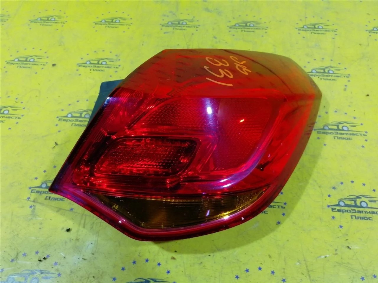 Фонарь Opel Astra 13319948 J, задний правый