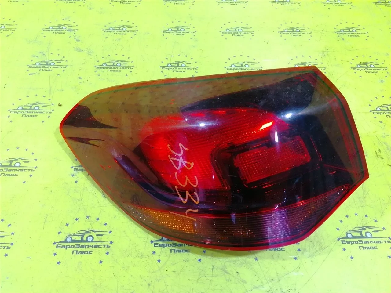 Фонарь Opel Astra 13282242 J, задний левый