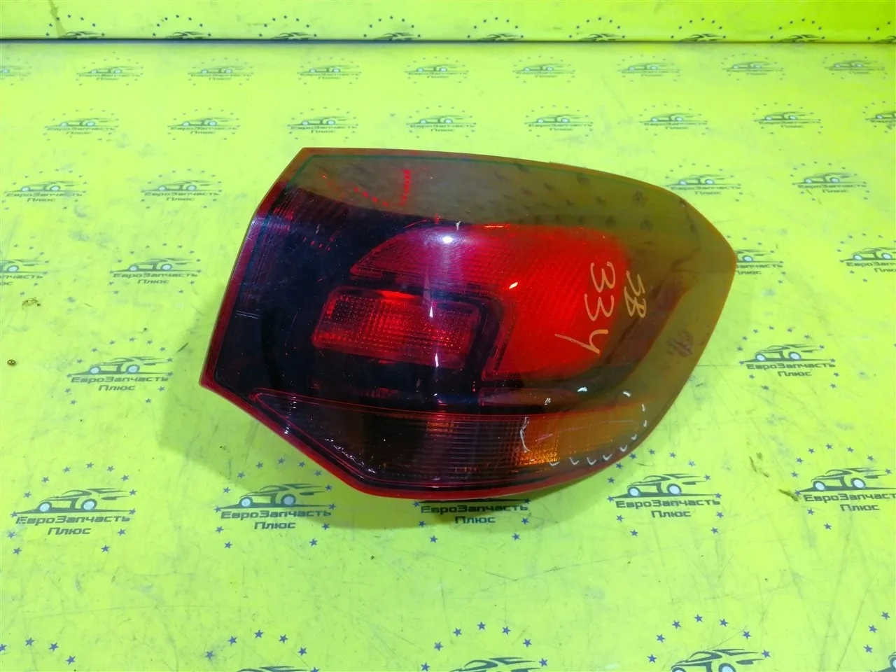 Фонарь Opel Astra 13282243 J, задний правый