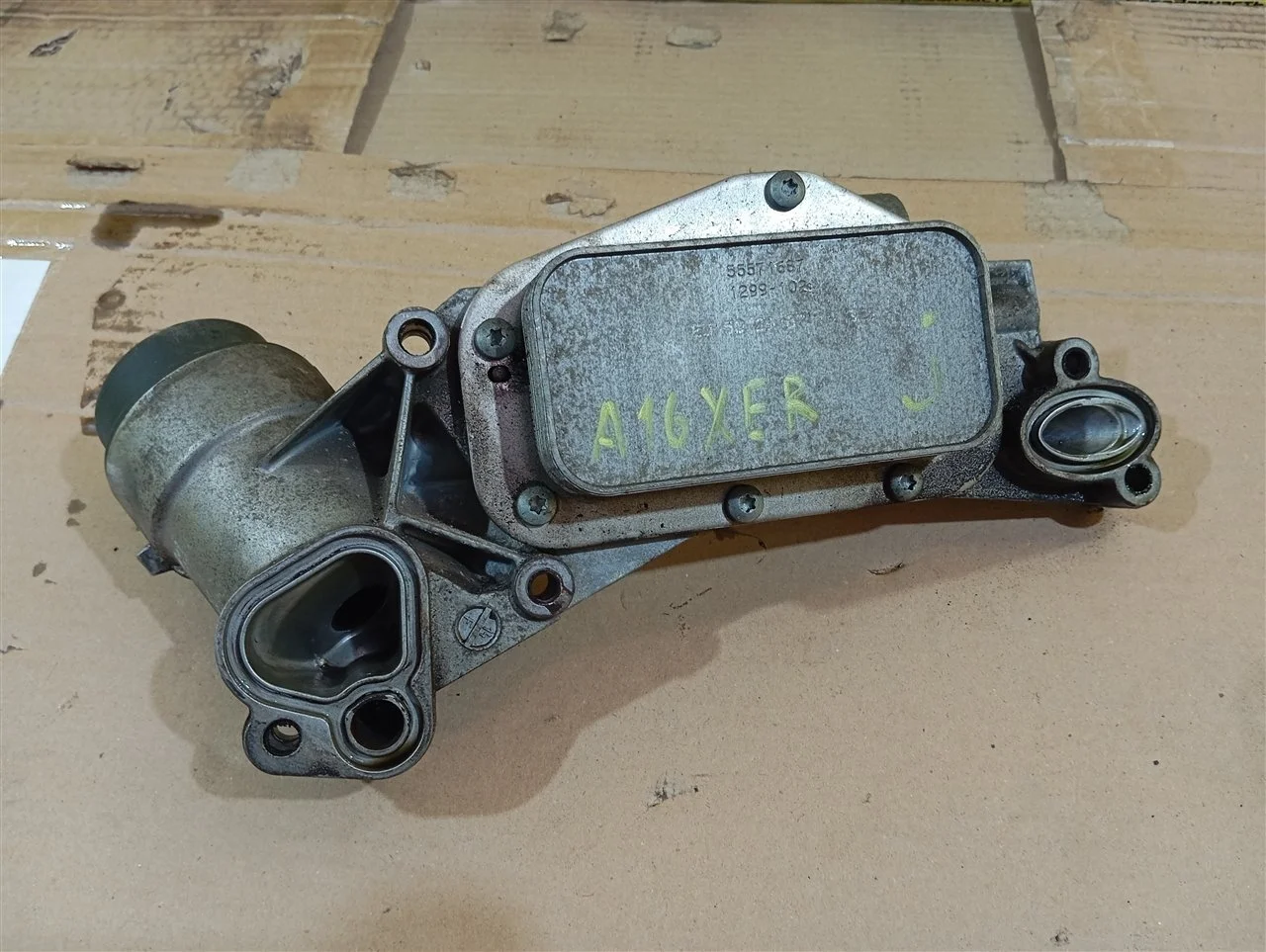 Корпус масляного фильтра Opel Astra 12992593 J A16XER