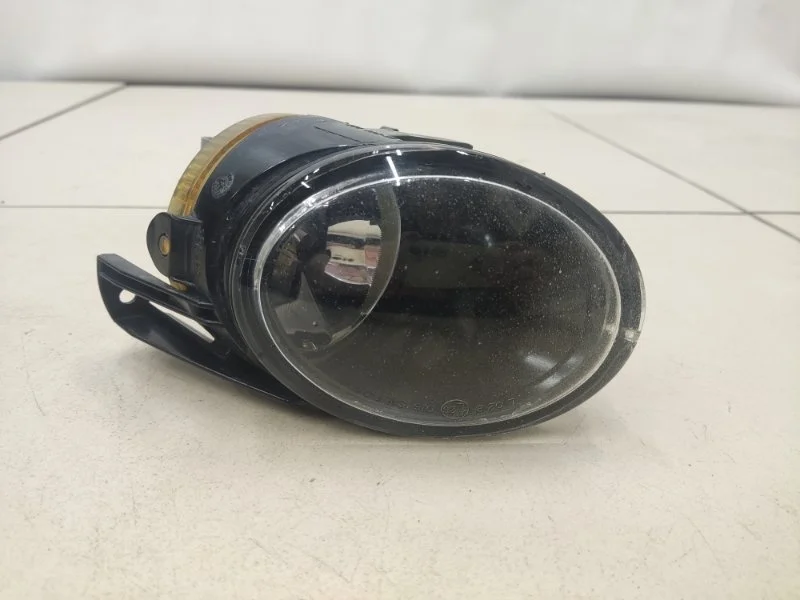 Фара противотуманная левая Volkswagen Passat B6