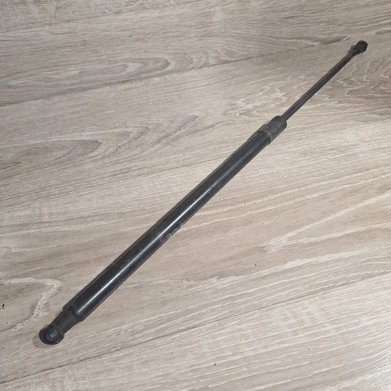 Амортизатор двери багажника Nissan X-Trail 2007-2015 90451JG40A T31, задний левый