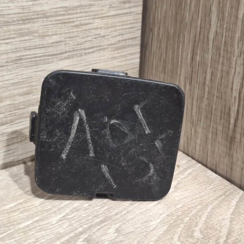 Заглушка буксировочного крюка Renault Logan 2013-2018 511809357R 2, передняя