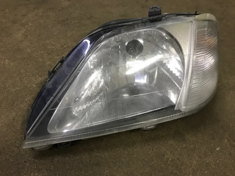 Фара галогеновая Renault Logan 2004-2009 6001546788 1, передняя левая