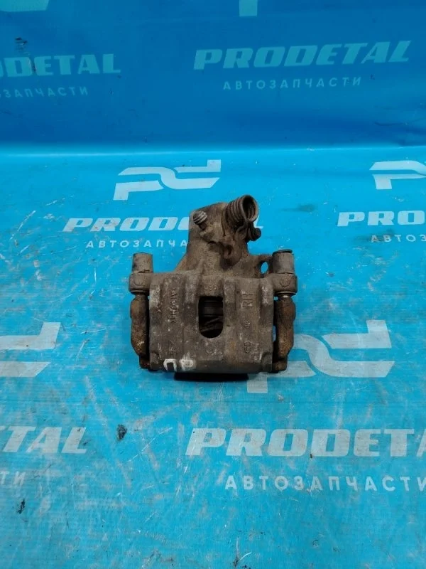 Суппорт тормозной задний правый Ford C-MAX