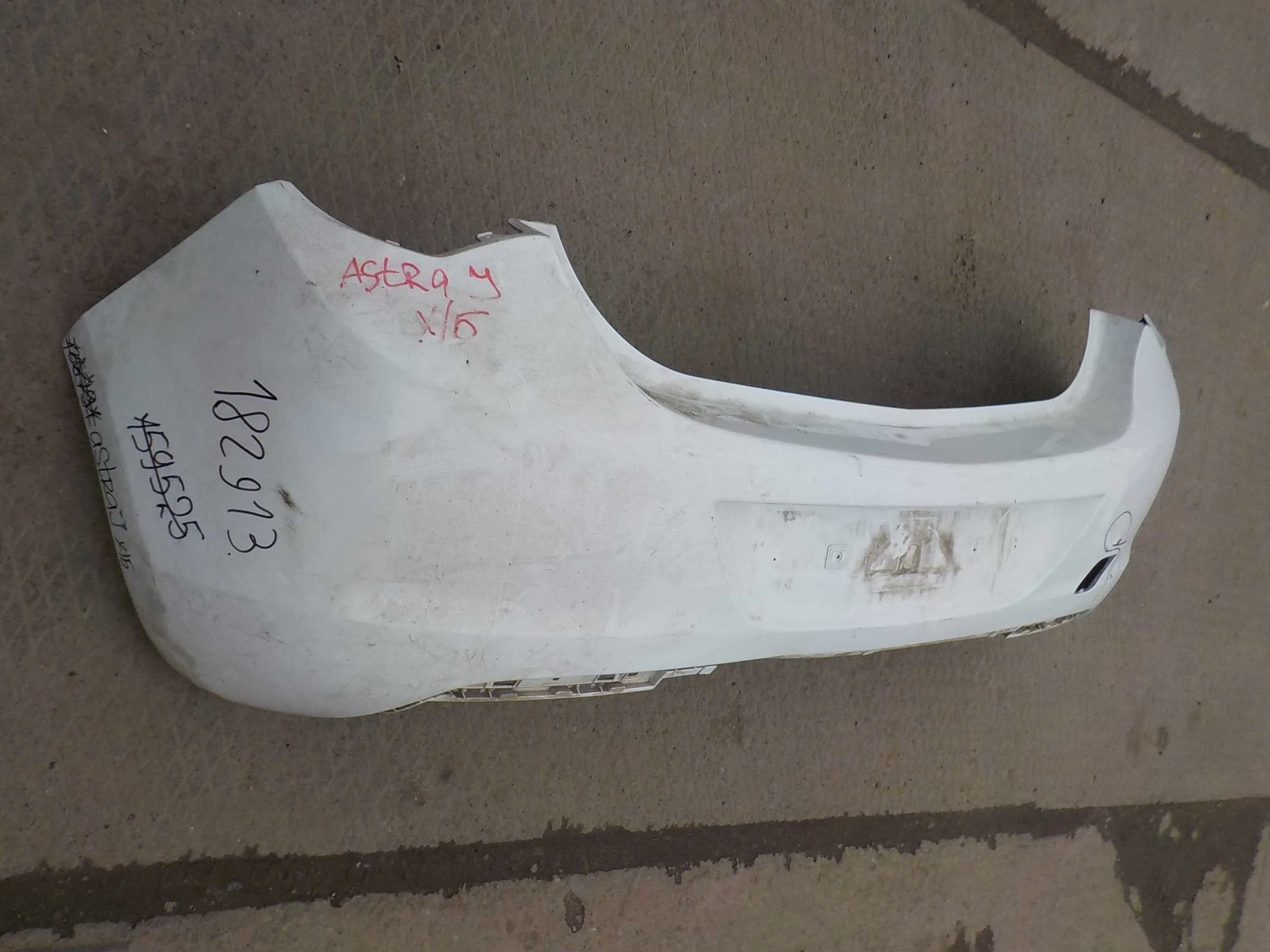 Бампер Opel Astra J (2009—2012) Зад