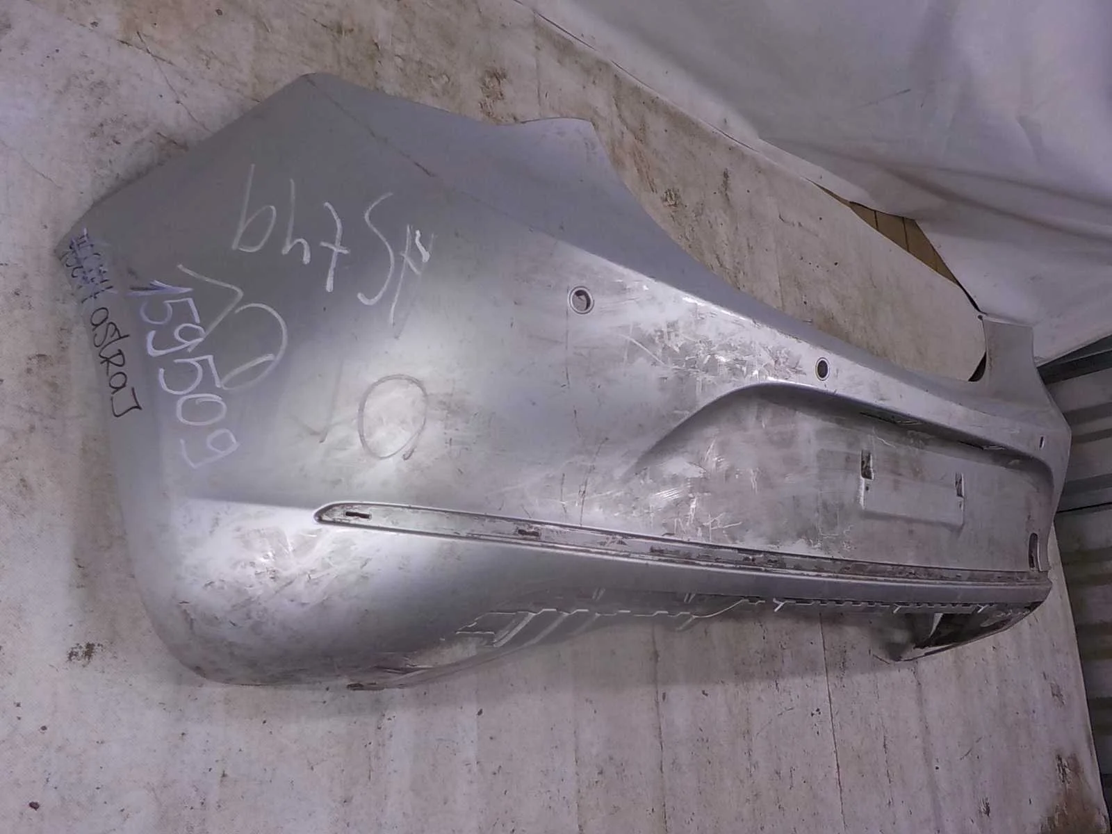 Бампер Opel Astra J (2009—2012) Зад