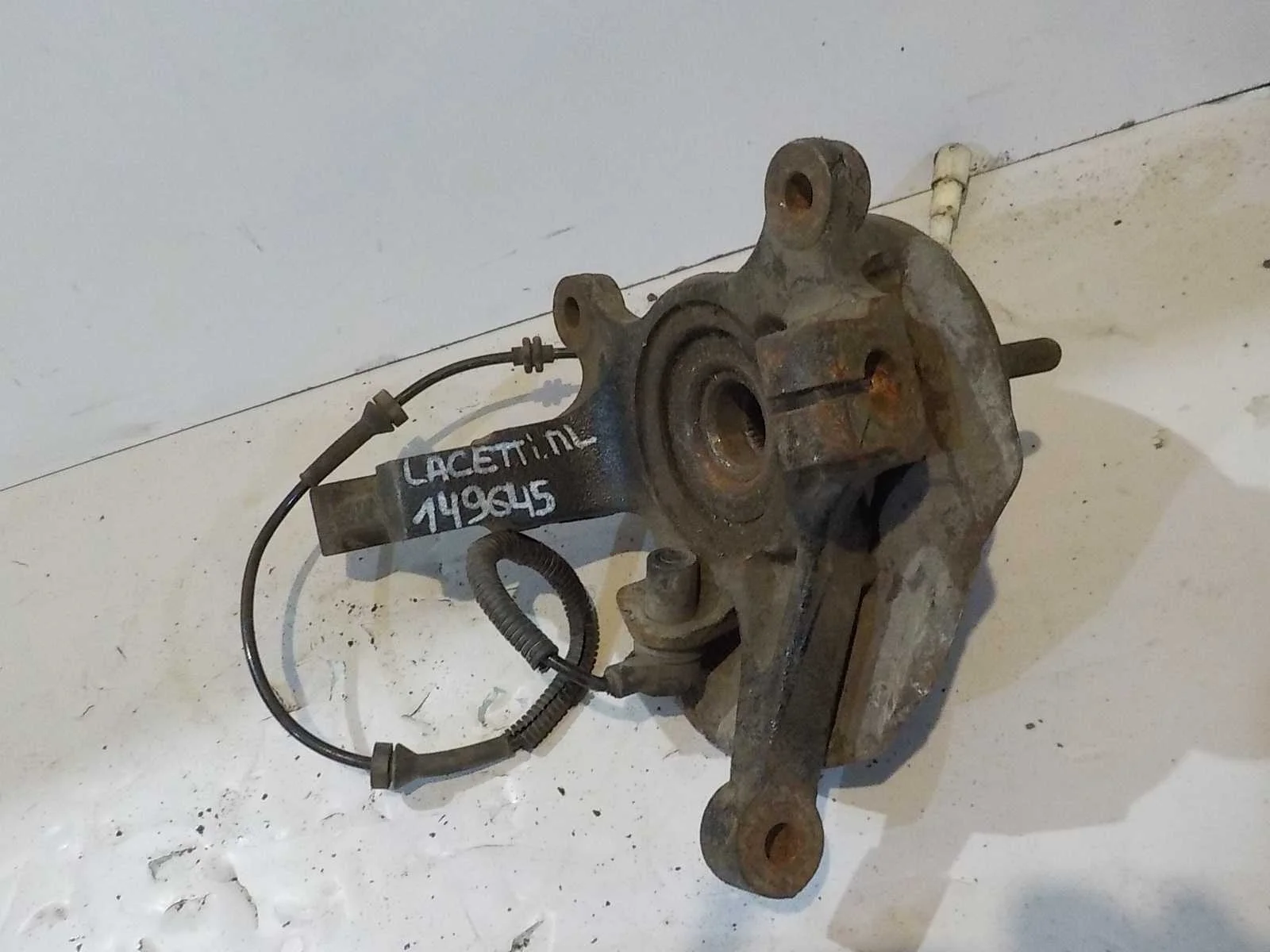 кулак поворотный Chevrolet Lacetti I (2004—2013) Перед Лево