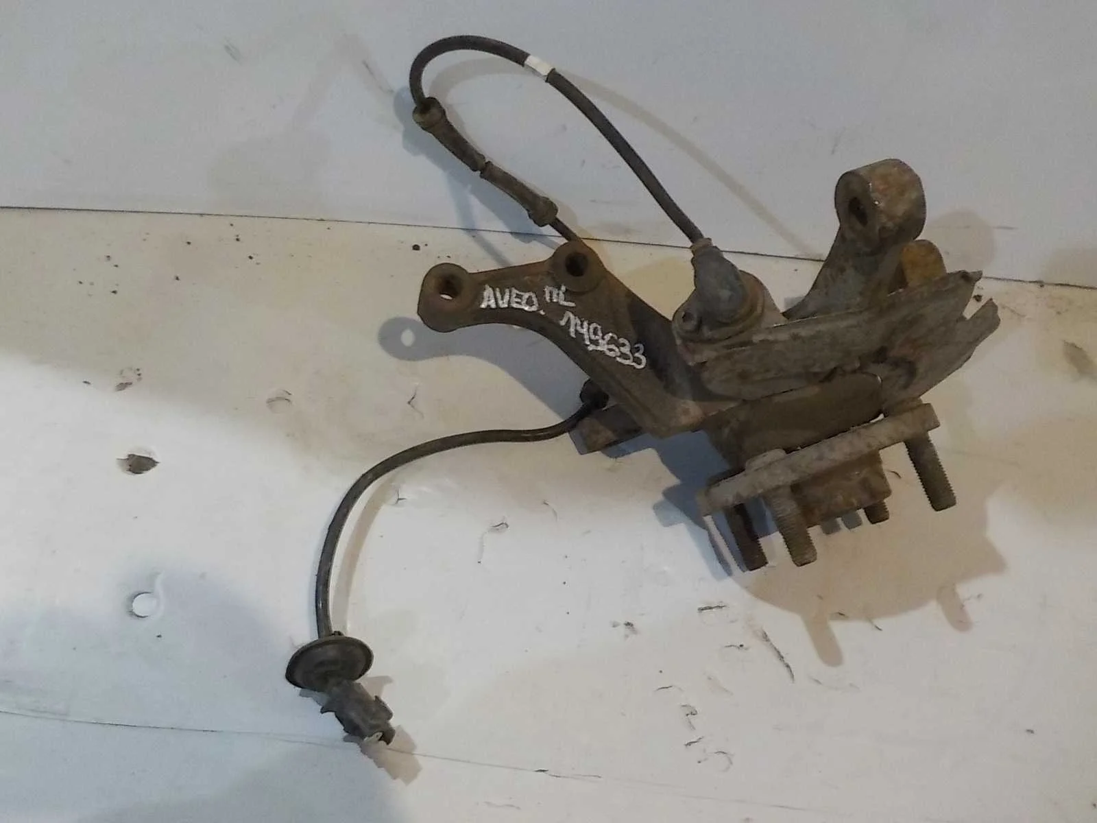 кулак поворотный Chevrolet Aveo I (2003—2008) Перед Лево