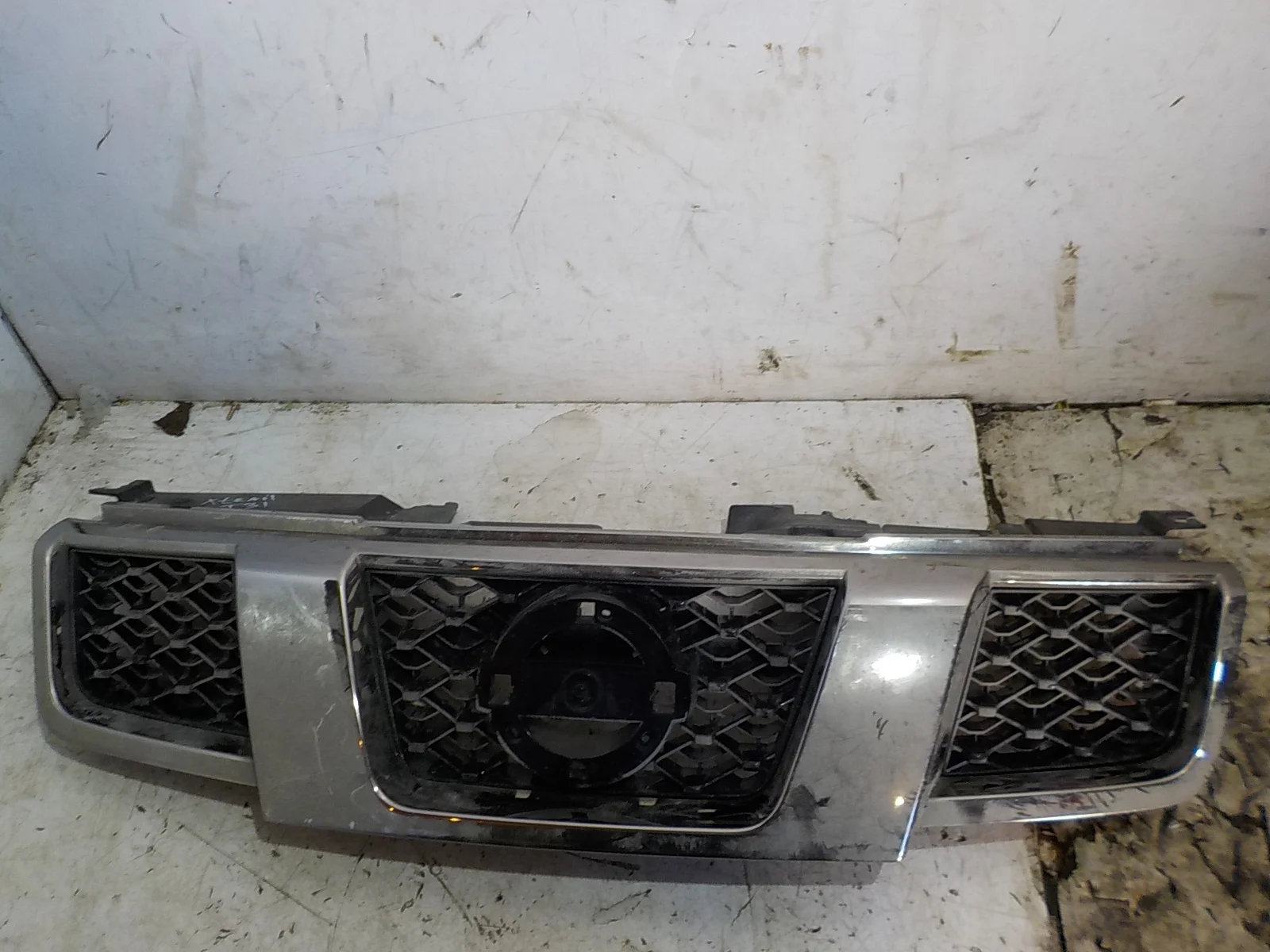 Решетка радиатора Nissan X-Trail II (2007—2011)