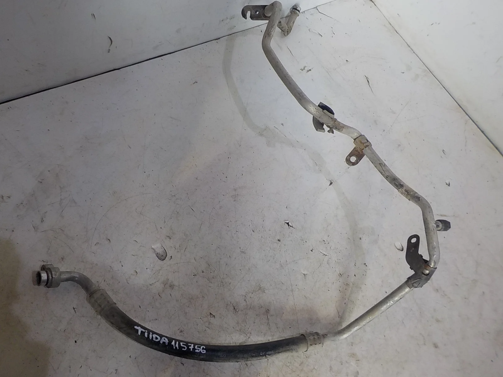 Трубка кондиционера Nissan Tiida C11 (2004—2012)