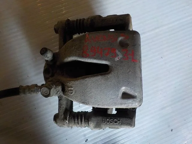 суппорт Toyota Avensis T250 (2003—2006) Зад Лево