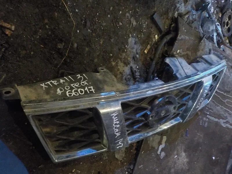 Решетка радиатора Nissan X-Trail II (2007—2011)