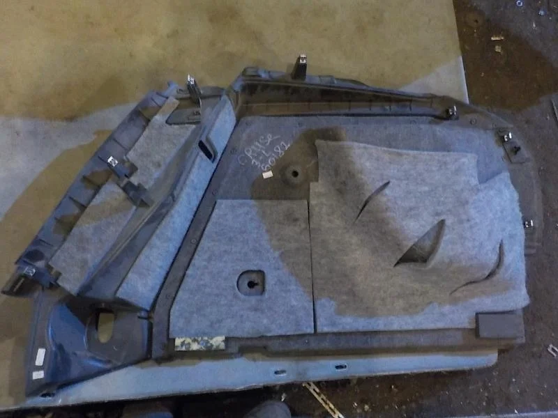 Обшивка багажника Chevrolet Cruze I (2009—2012)  Лево