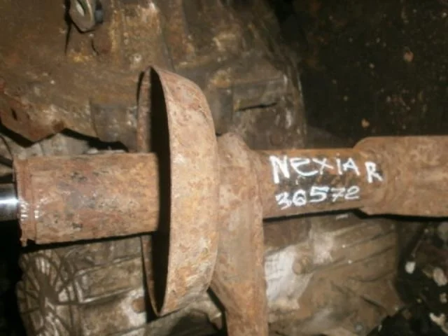 амортизатор Daewoo Nexia I (1995—2008) Перед Право