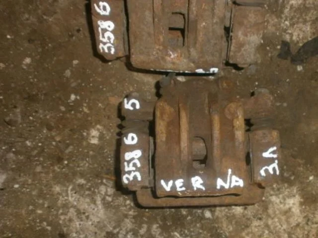 суппорт Kia Rio II (2005—2009) Зад Лево