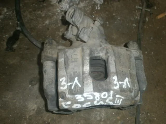 суппорт Ford Focus III (2011—2015) Зад Лево