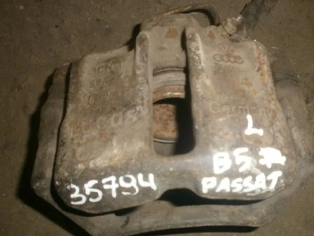 суппорт Audi A4 B6 (2000—2006) Перед Лево