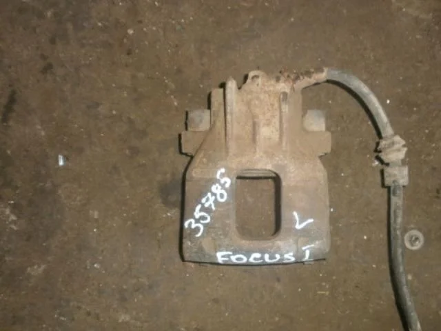 суппорт Ford Focus I (1998—2004) Перед Лево