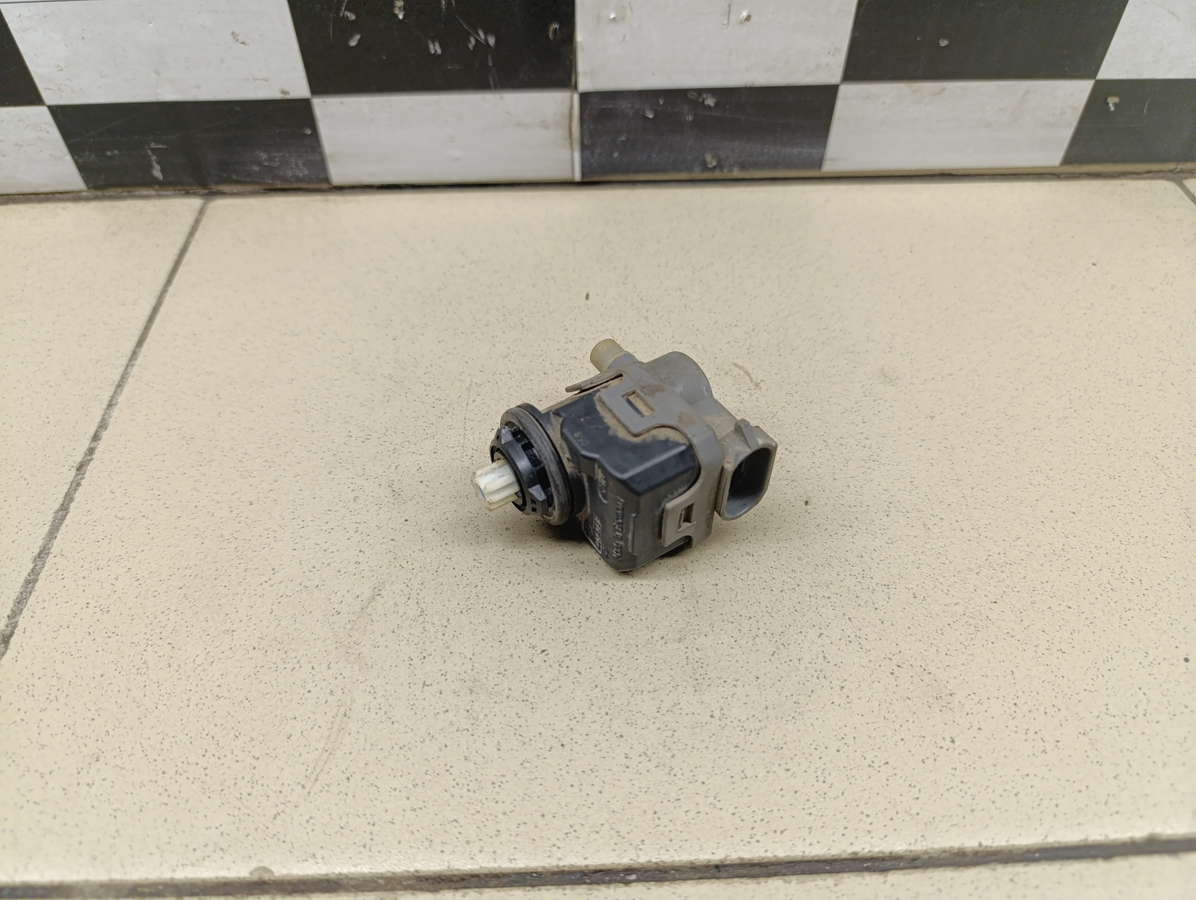 Моторчик корректора фары Almera Classic (B10) 2006-2013