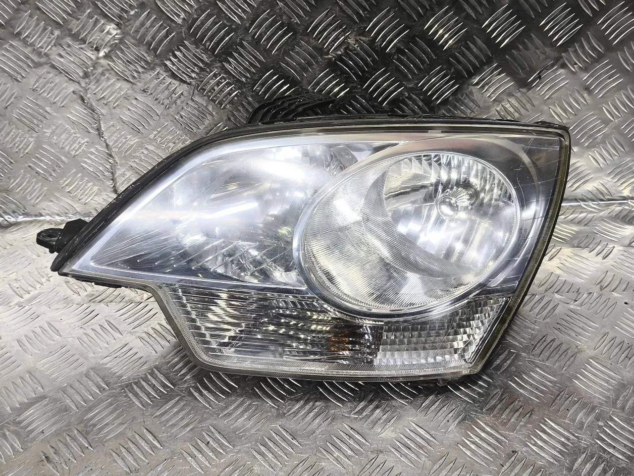 фара левая Opel Antara