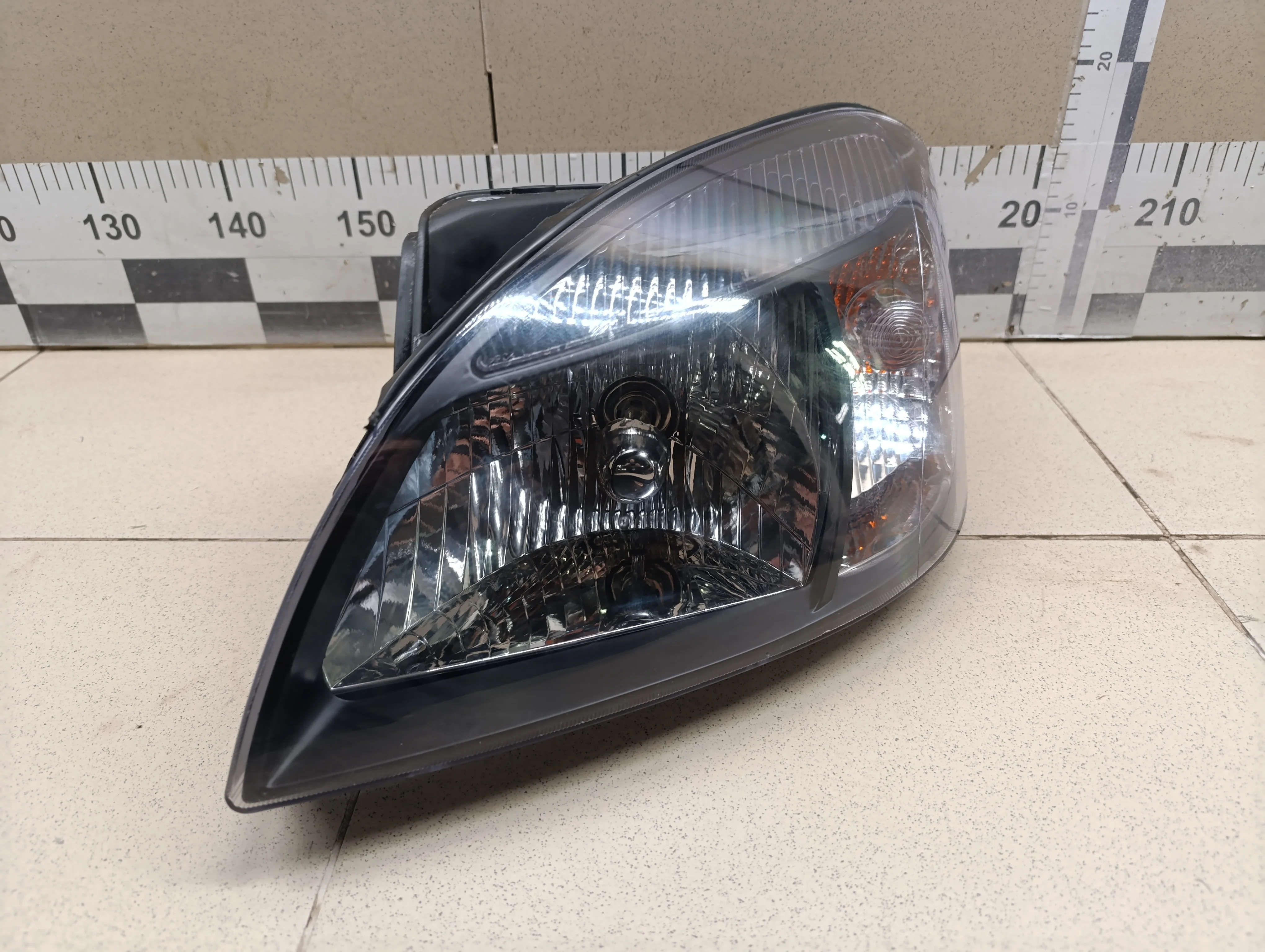 Фара левая RIO 2005-2011