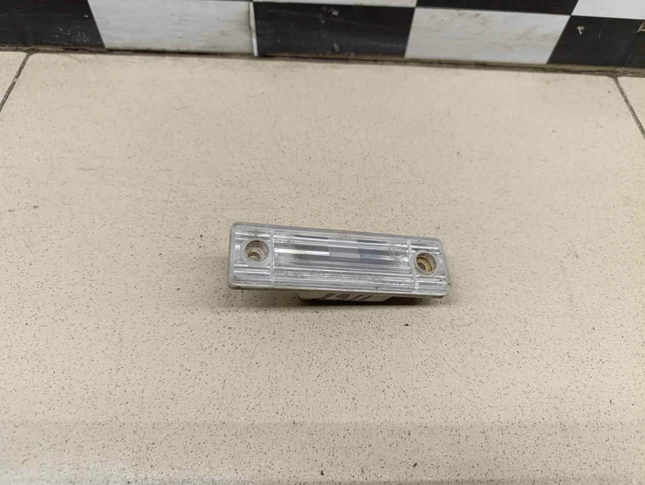 Фонарь подсветки номера Aveo (T200) 2003-2008