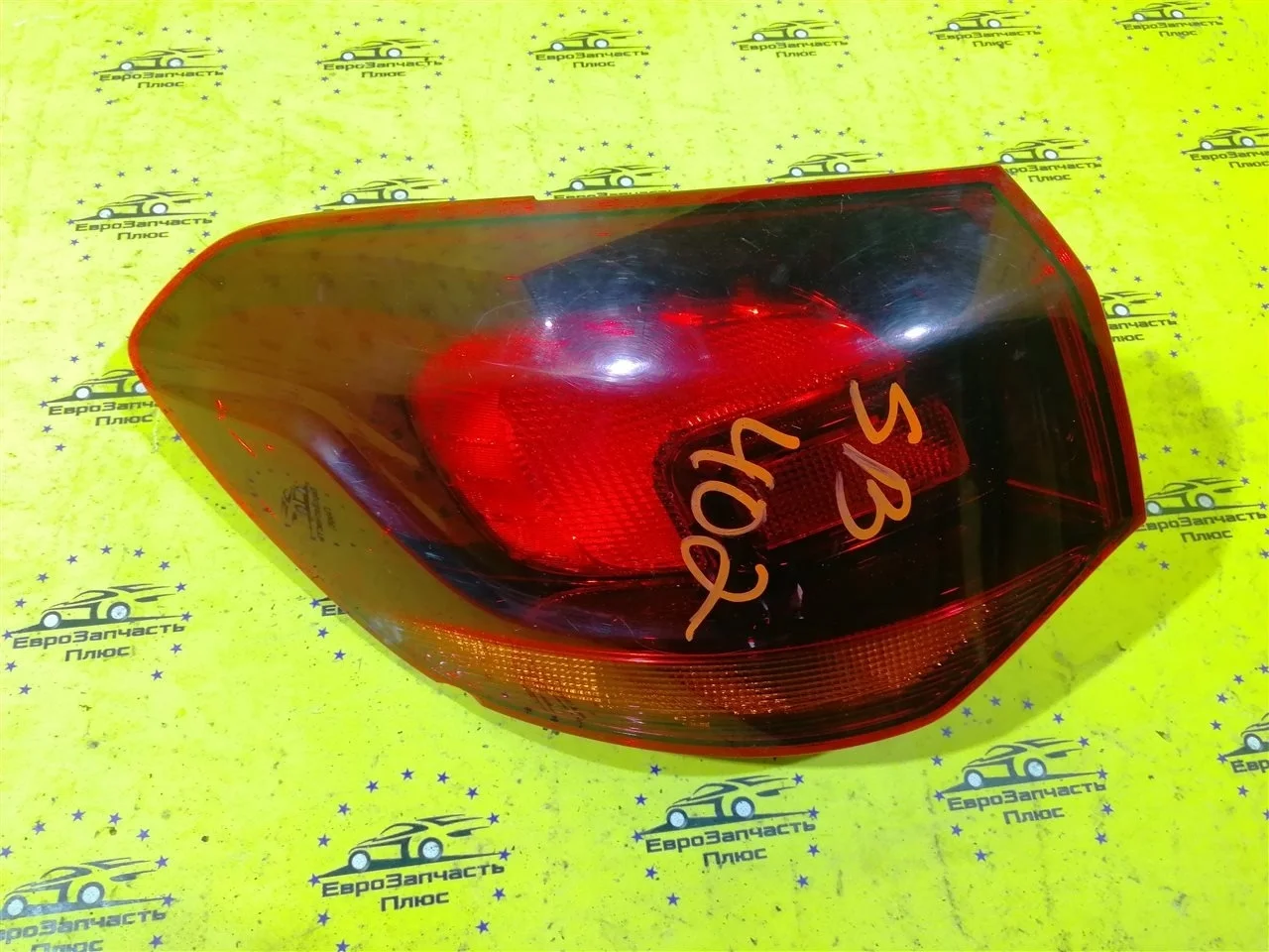 Фонарь Opel Astra 13314052 J, задний левый