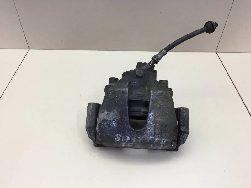 Суппорт передний левый Ford Focus 2 (DA) 2005-2008