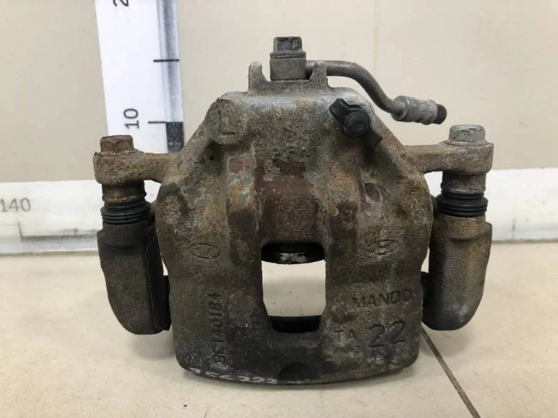 Суппорт передний левый Kia Rio 3 (UB) 2011-2017