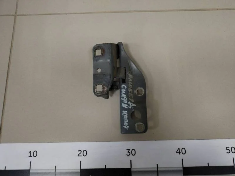 Петля капота левая Nissan Almera (N16) 2000-2006