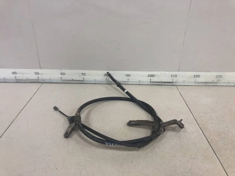 Трос стояночного тормоза левый Hyundai Solaris 2010-2017