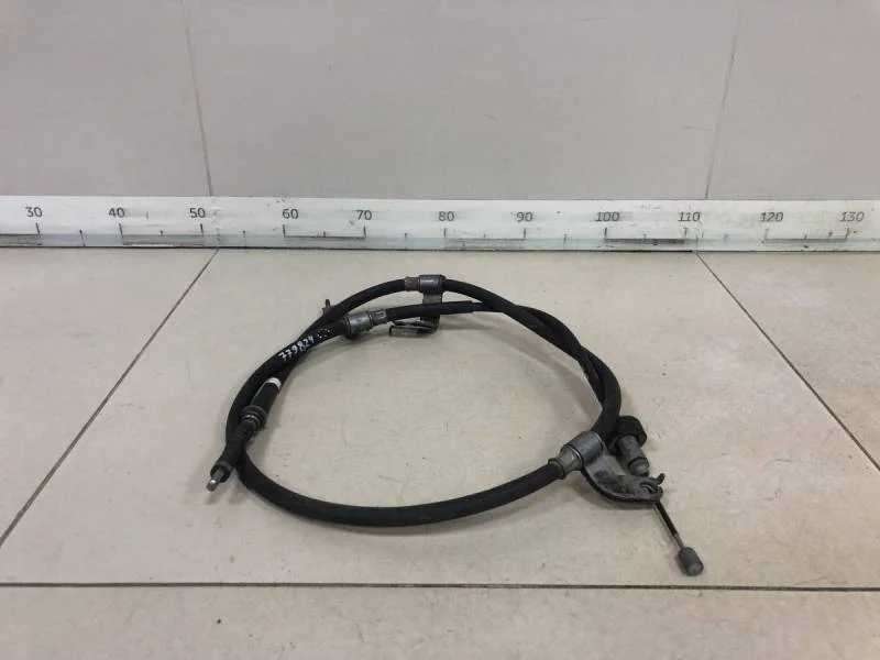 Трос стояночного тормоза левый Hyundai Solaris 2010-2017