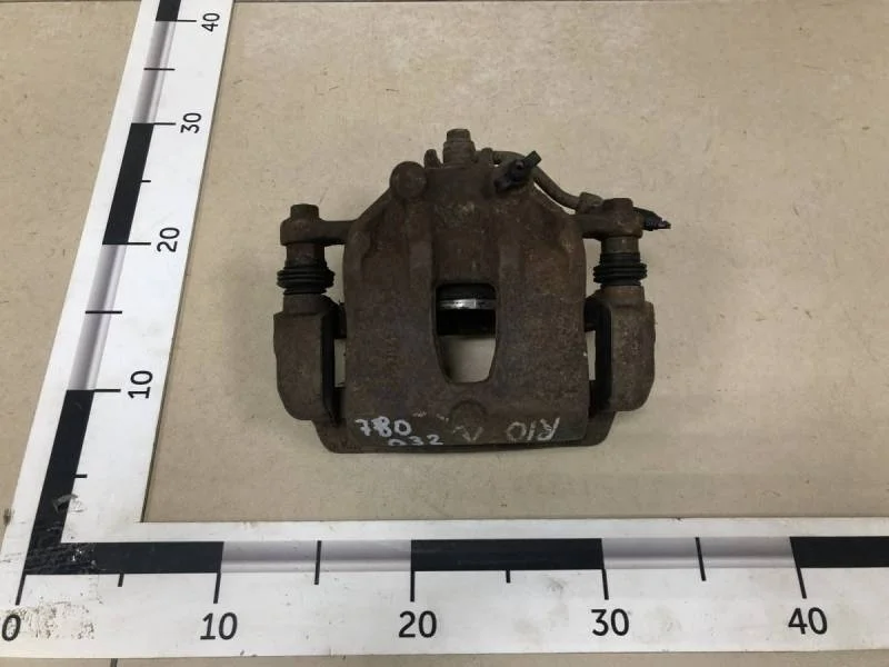 Суппорт передний левый Kia Rio 3 (UB) 2011-2017