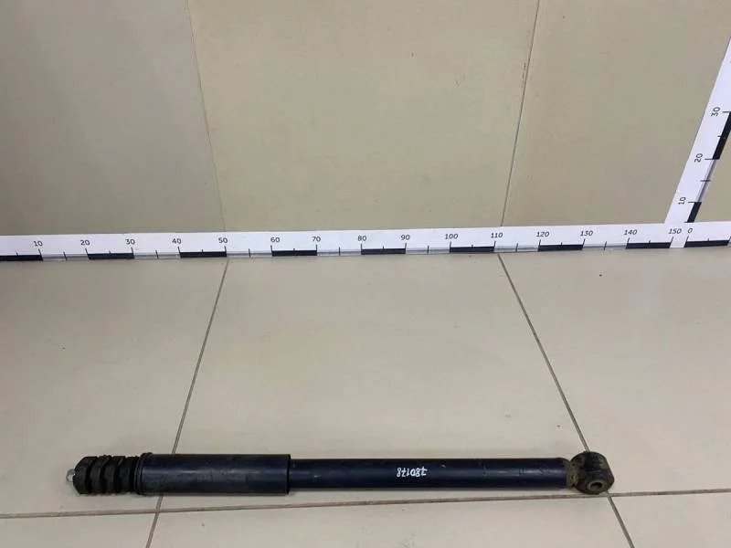 Амортизатор задний Nissan Terrano (D10) 2014>