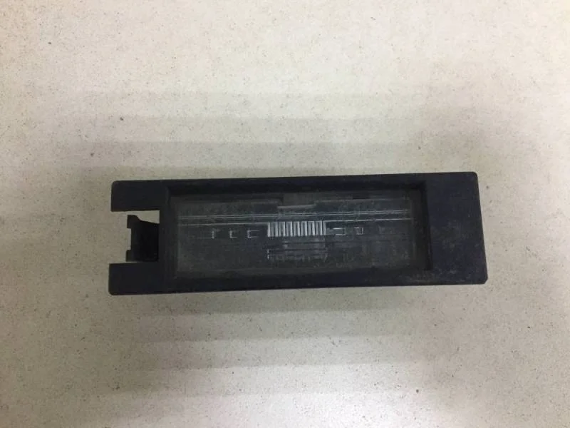 Фонарь подсветки номера Opel Astra J 2010-2017