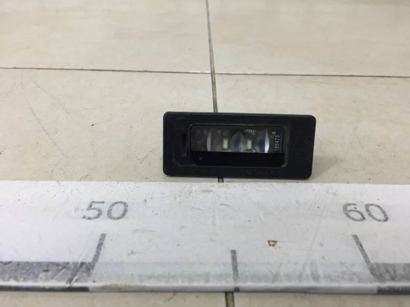 Фонарь подсветки номера Volkswagen Jetta (5K) 2011>