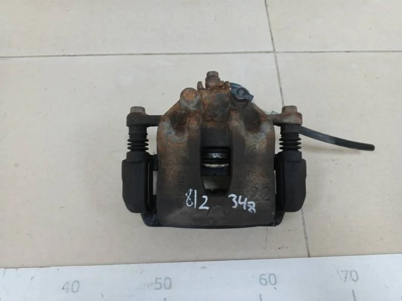 Суппорт передний левый Kia Rio 3 (UB) 2011-2017